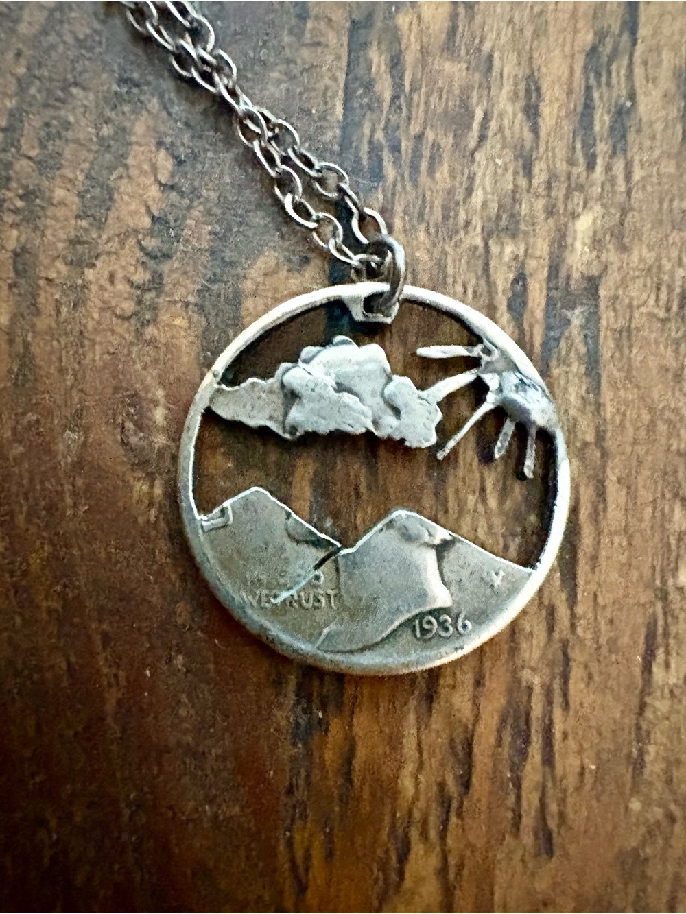 Vintage 1936 dime made into a mountain landscape. Popular in the 70’s